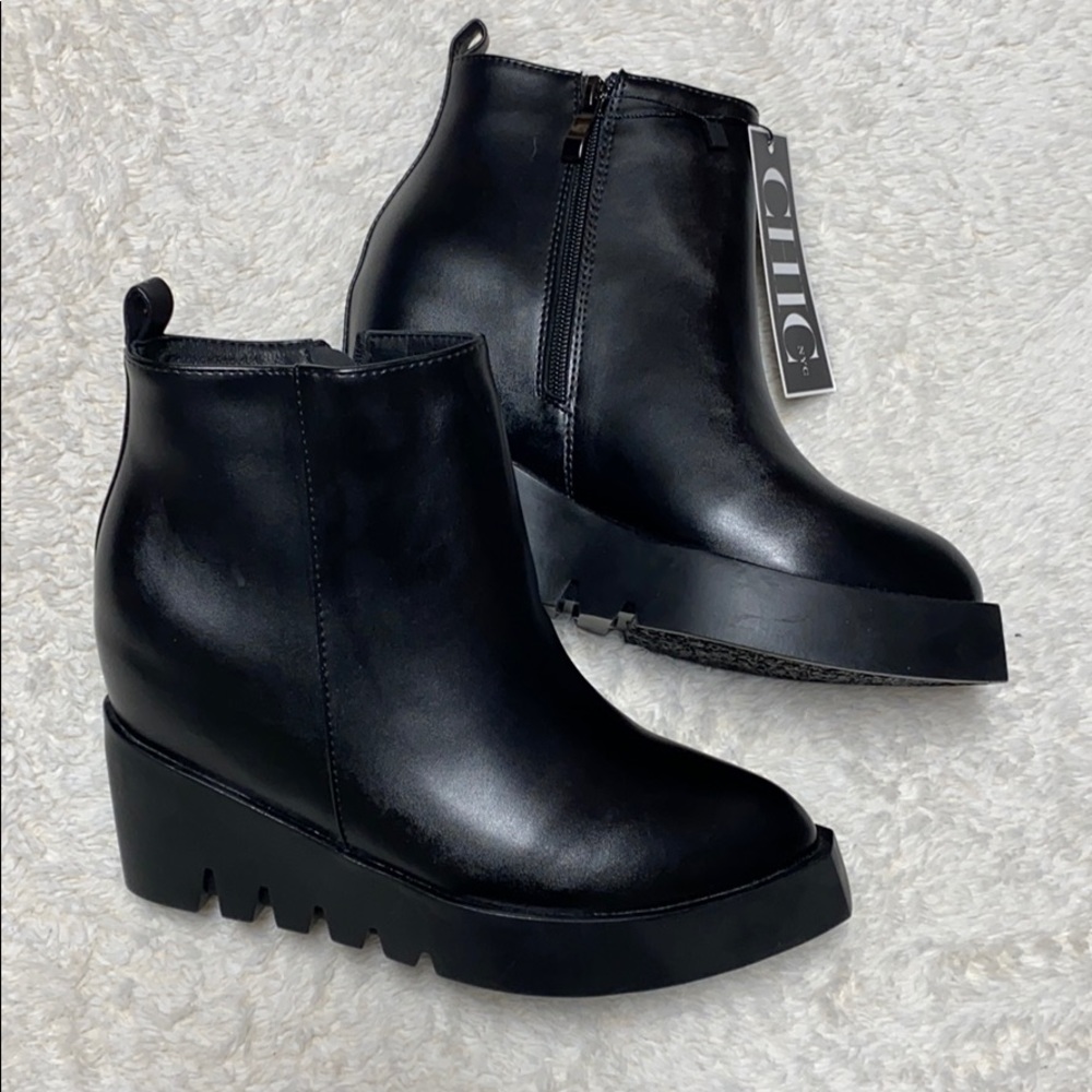 Black wedge booties